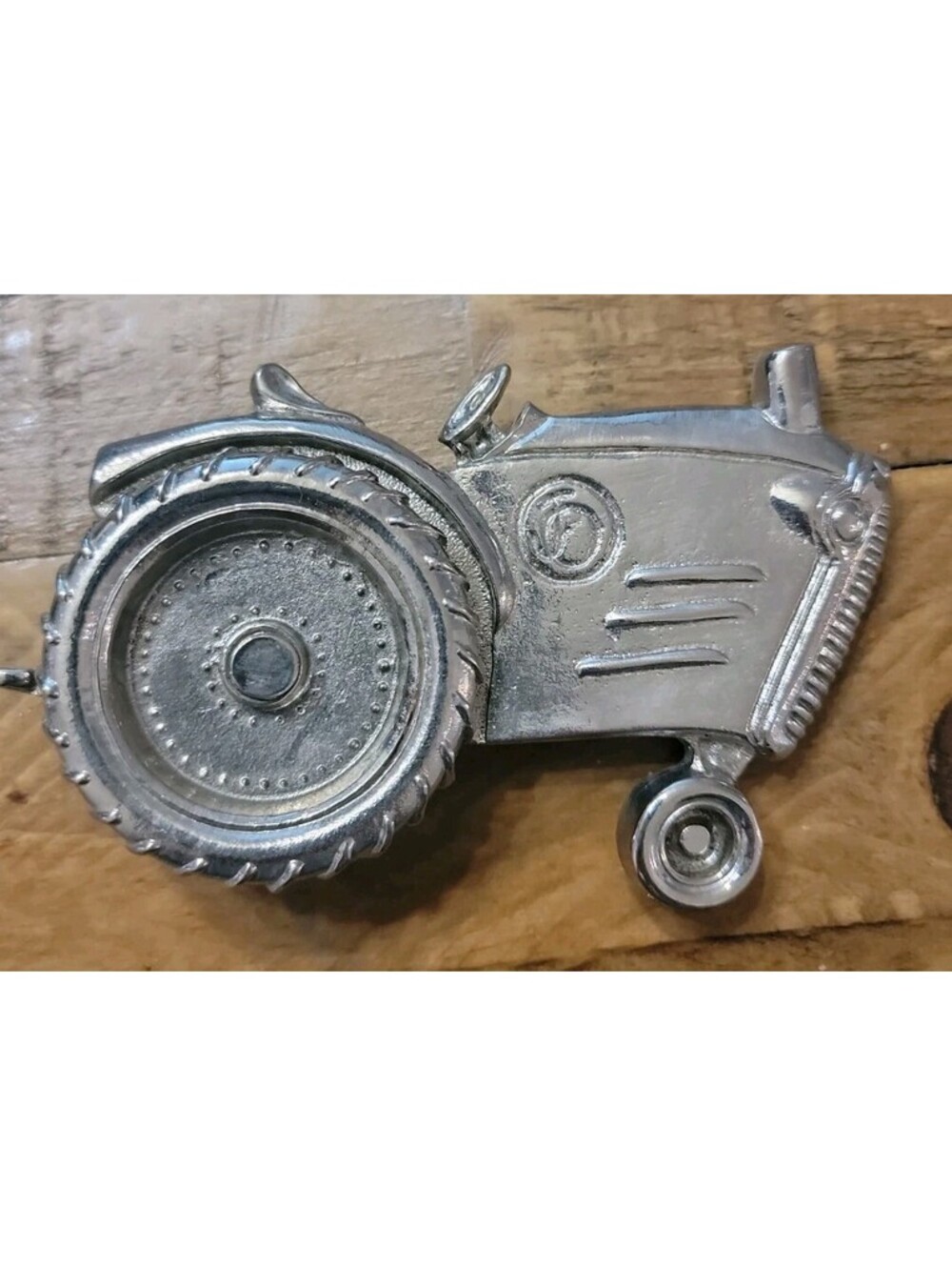 2004 Olander silver tractor belt buckle spinning back wheel